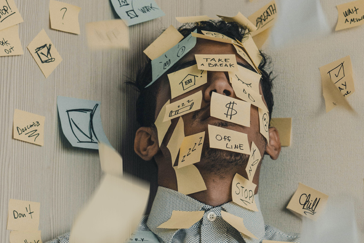 post-it-note-man-stuck-to-wall