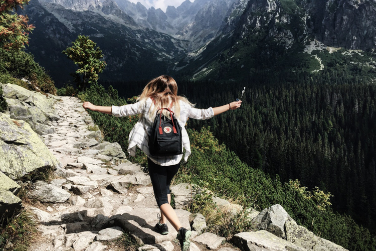 lady-running-mountainside-750-500